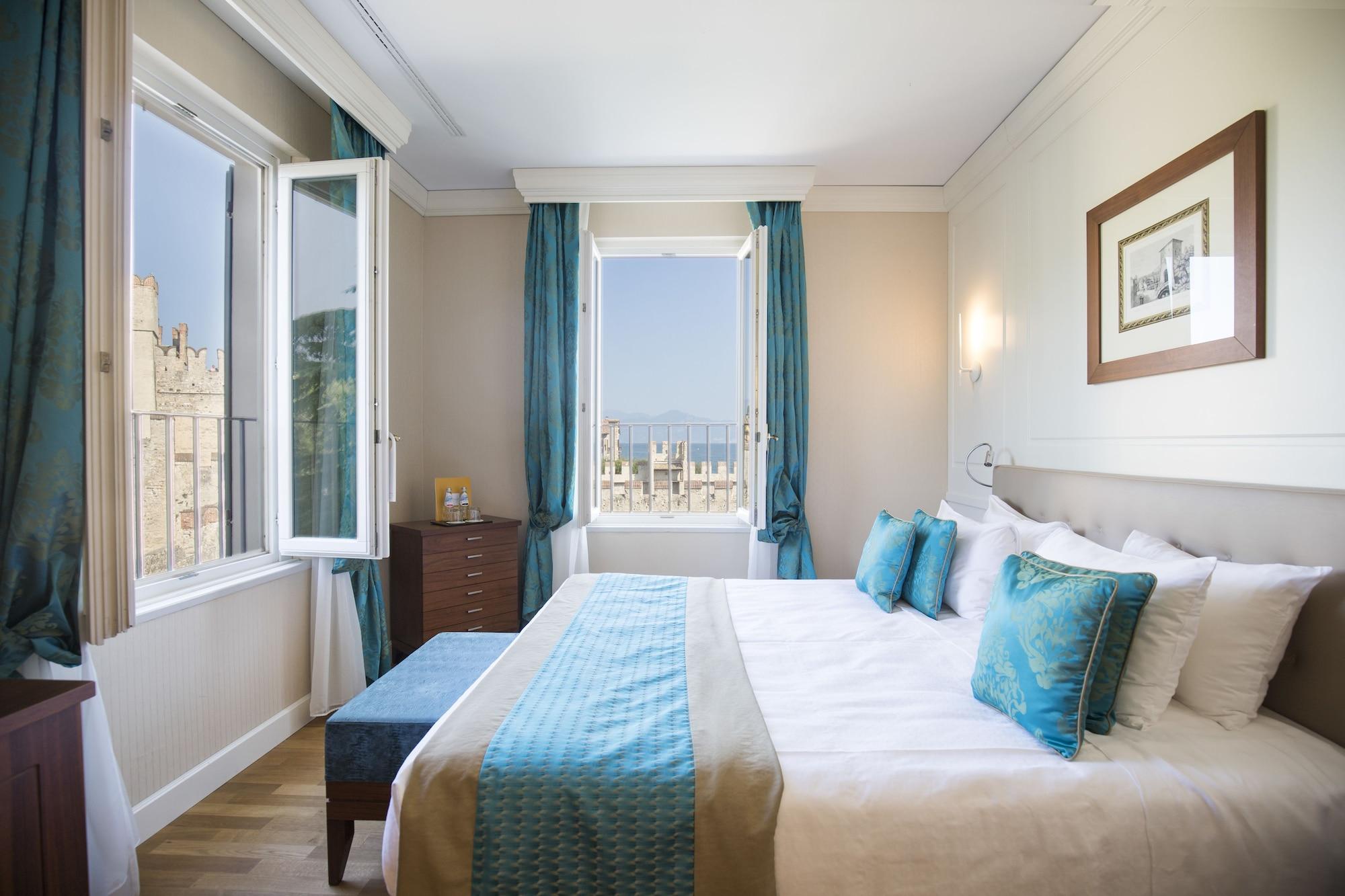 Grand Hotel Terme Sirmione Exterior photo A bedroom at the Westin Palace, Madrid